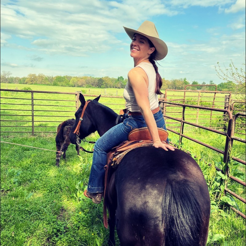 Lauren Manning sitting on a horse