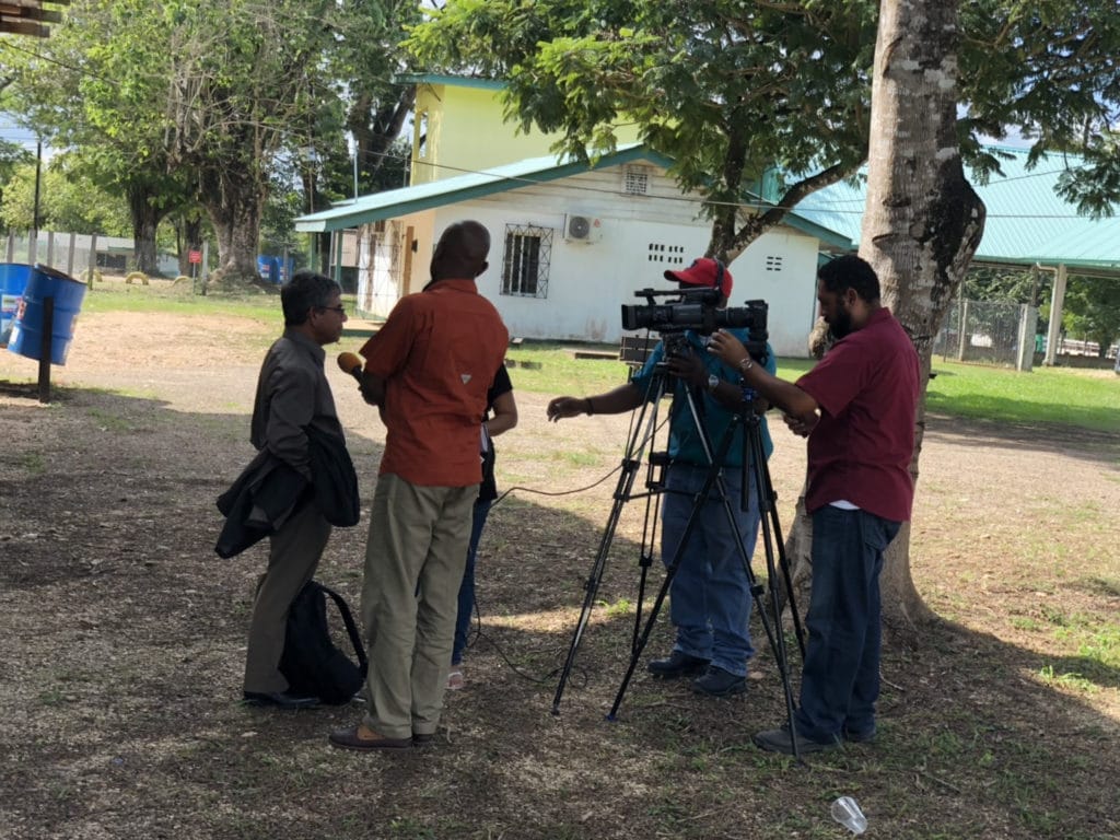 Reginaldo Haslett-Marroquin gives a TV interview at the Tropical Agriculture Conference in Belize